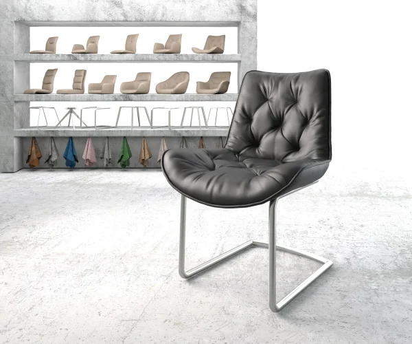 Cantilever Taimi-Flex cuir de vache noir pied cantilever rond acier inoxydable brossé