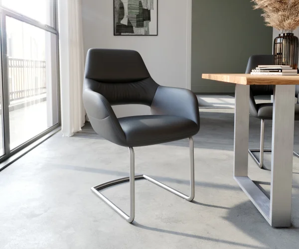 Cantilever Yago-Flex avec accoudoirs cuir de vache noir pied cantilever rond acier inoxydable brossé ressorts ensachés