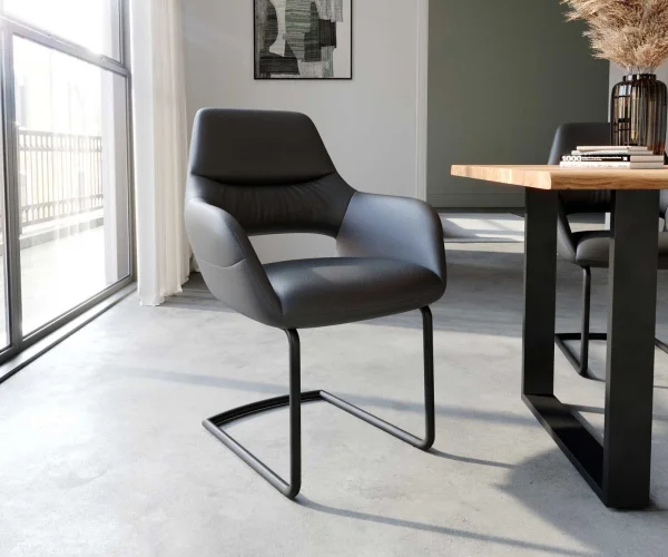 Cantilever Yago-Flex avec accoudoirs cuir de vache noir pied cantilever rond noir ressorts ensachés