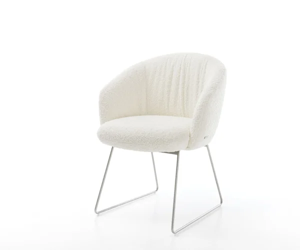 Chaise-de-salle-à-manger Caja-Flex avec accoudoirs bouclé blanc pied trapèze acier inoxydable brossé ressorts ensachés
