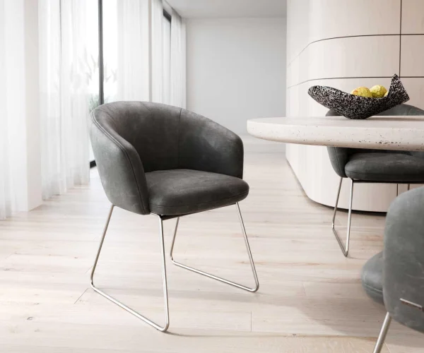Chaise-de-salle-à-manger Caja-Flex avec accoudoirs microvelours anthracite vintage pied trapèze acier inoxydable brossé ressorts ensachés