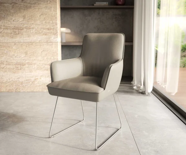 Chaise-de-salle-à-manger Heira-Flex avec accoudoirs cuir de vache couleur boue pied trapèze acier inoxydable brossé ressorts ensachés