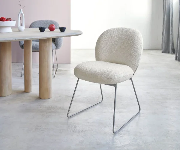 Chaise-de-salle-à-manger Nube-Flex bouclé blanc pied trapèze acier inoxydable brossé ressorts ensachés