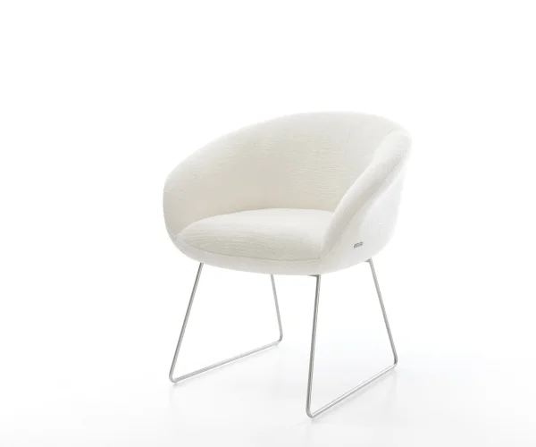 Chaise-de-salle-à-manger Vinka-Flex avec accoudoirs bouclé doux beige pied trapèze acier inoxydable resorts ensachés