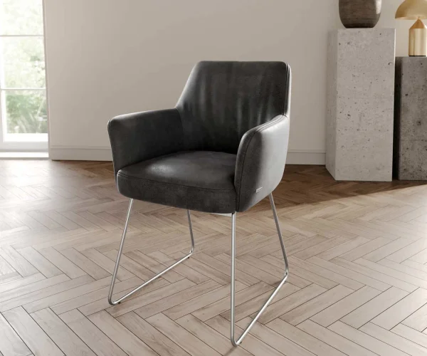 Chaise-de-salle-à-manger Xana-Flex avec accoudoirs microvelours anthracite vintage pied trapèze acier inoxydable brossé ressorts ensachés