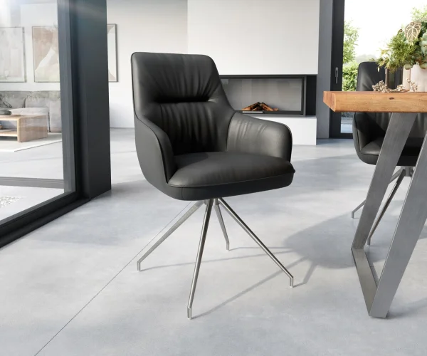 Chaise-de-salle-à-manger Zelia-Flex avec accoudoirs cuir de vache noir pied croisé conique acier inoxydable brossé ressorts ensachés