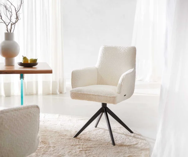Chaise-pivotante Heira-Flex avec accoudoirs bouclé blanc pied croisé large noir pivotement sur 360° ressorts ensachés