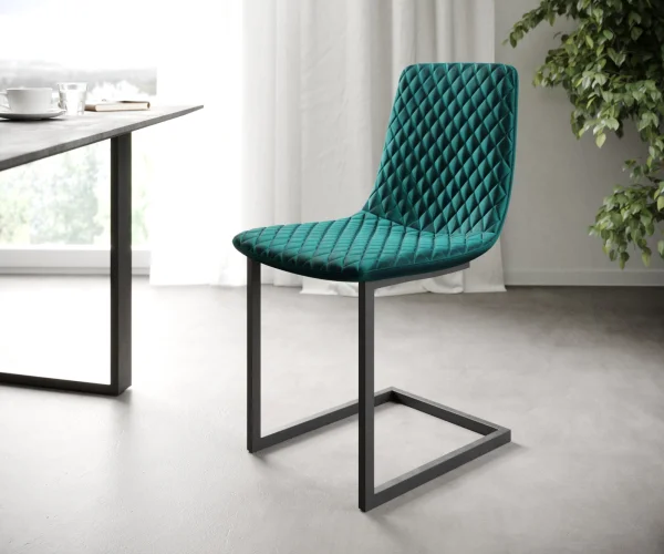 L'ensemble-de-4-chaises Novi-Adesso pétrole velours cantilever